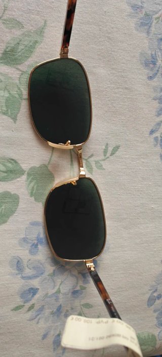 Gafas de sol Ray-Ban doradas y verdes