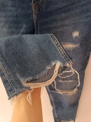 Jeans blu strappati