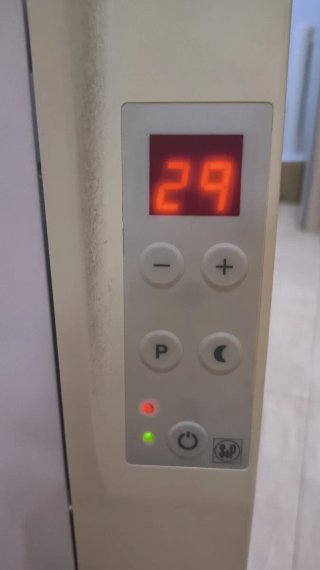 Radiador eléctrico beige y blanco