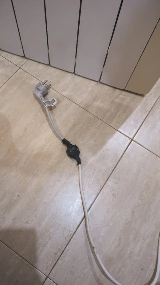 Radiador eléctrico beige y blanco
