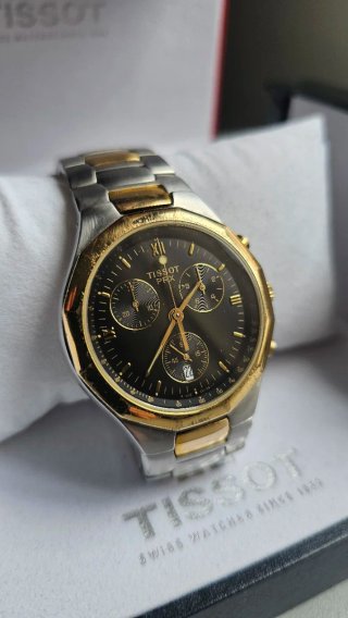 Reloj Tissot PRX Cronógrafo bicolor acero/dorado