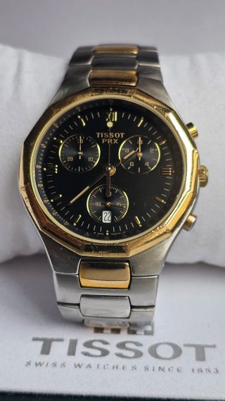 Reloj Tissot PRX Cronógrafo bicolor acero/dorado