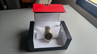 Reloj Tissot PRX Cronógrafo bicolor acero/dorado