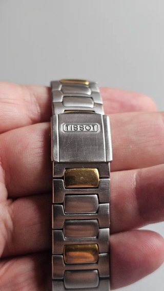 Reloj Tissot PRX Cronógrafo bicolor acero/dorado
