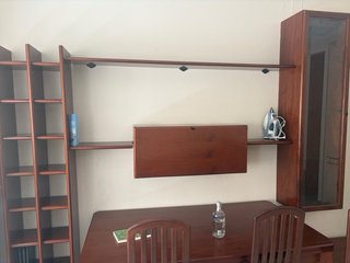Muebles de salón comedor  madera oscura.