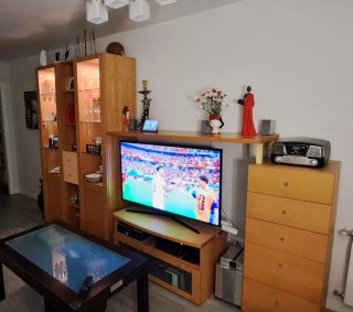 Mueble de salón madera y cristal