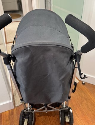 Silla de paseo paraguas naranja y negra