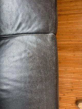 Sofá seccional de piel negro para restaurar