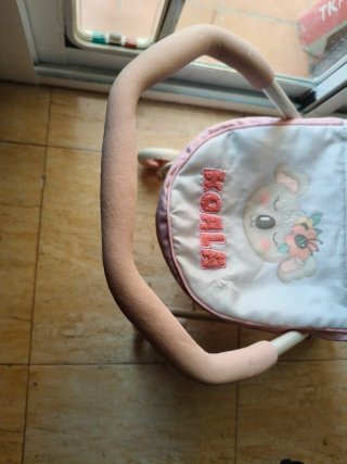 Cochecito de muñecas rosa