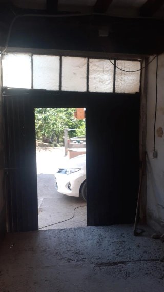 Puerta corredera de hierro
