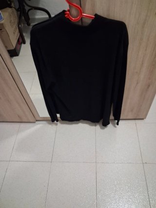 Chaqueta negra con bolsillos