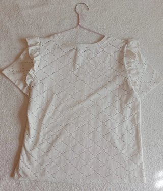 Blusa blanca de ZARA.