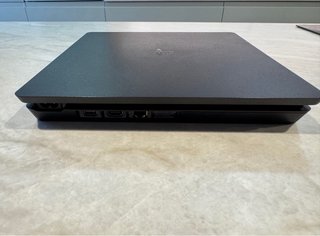 PS4 Slim Negra + 2 Mandos + Juegos