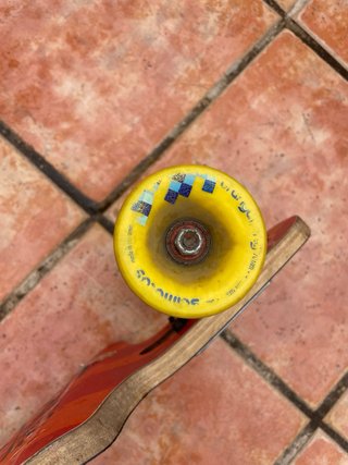 Longboard Rayne Negro con Ruedas Amarillas