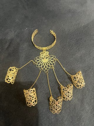 Pulsera esclava dorada con anillos