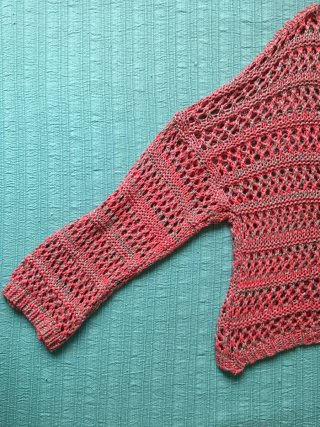 Jersey calado coral y plata talla única