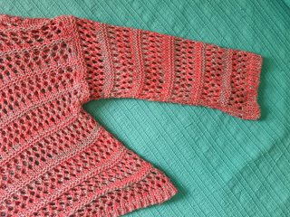 Jersey calado coral y plata talla única