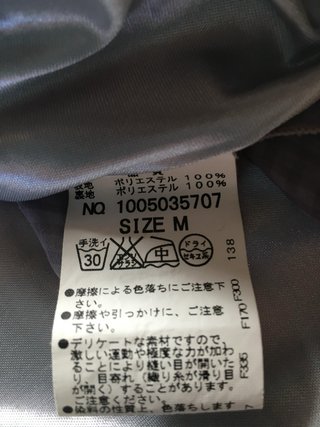 Canottiera in tessuto velato grigio e bianco