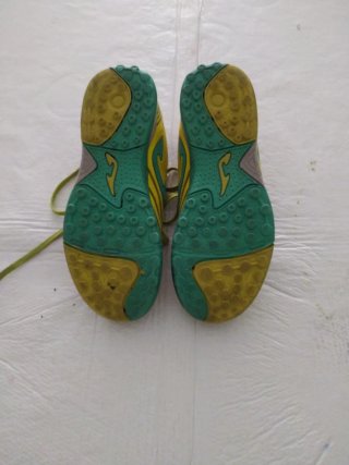 Botas de fútbol Joma niño amarillas