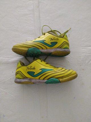 Botas de fútbol Joma niño amarillas