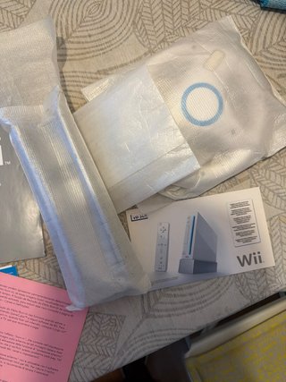 Accessori Wii e manuali di istruzioni