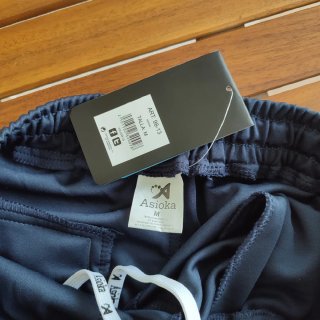 Conjunto deportivo Asioka gris y blanca