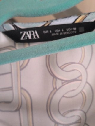 Blusa Zara cruzada estampado cadenas