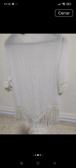 Vestido blanco con flecos y pompones