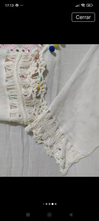 Vestido blanco con flecos y pompones