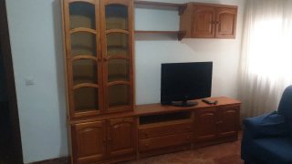 Mueble de salón madera y cristal