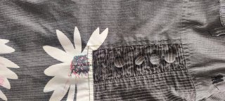 Preciosa falda de Desigual, flores fondo gris.