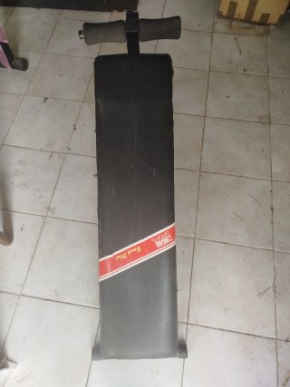 Bicicleta estática y banco abdominales