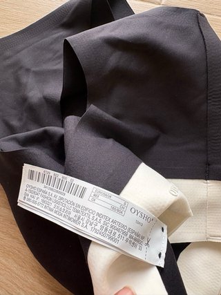 Top deportivo Oysho negro/blanco Talla S
