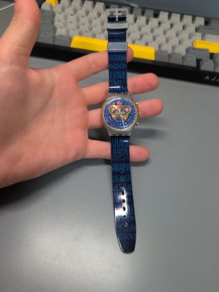 Reloj Swatch Cronógrafo Azul y Dorado