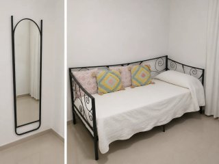 Cama nido y espejo forja