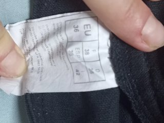 Pantalón campana negro con cinturón