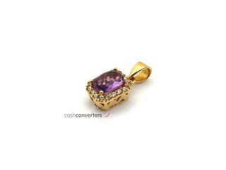 colgante oro 18k con piedra con circonita,cuarzo