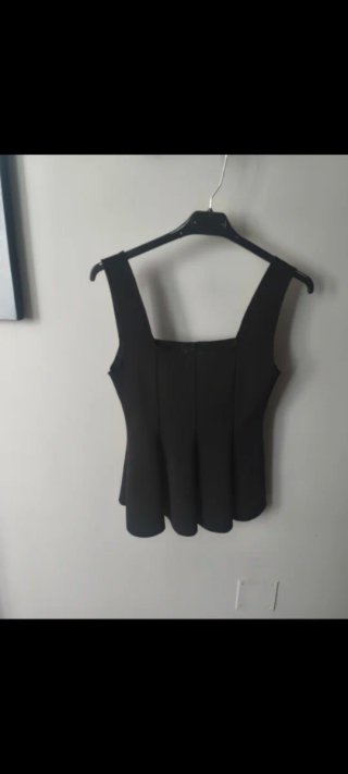 Top peplum negro talla M