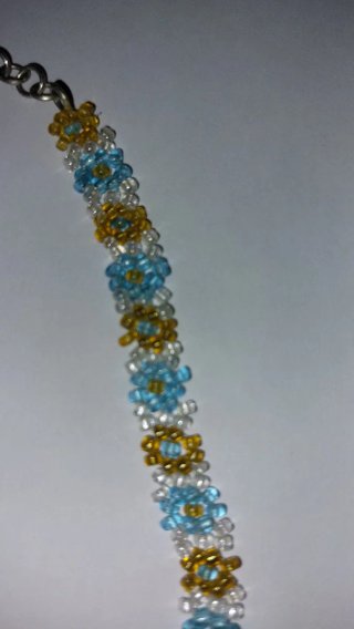 Collar de cuentas flores doradas y azules