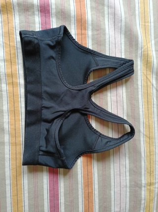 Top deportivo Nike negro mujer