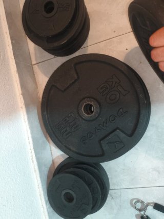 Lote de pesas y barras como nuevo Discos y Barras