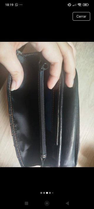 Cartera de piel nueva solidaria