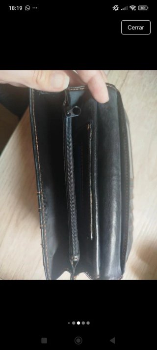 Cartera de piel nueva solidaria