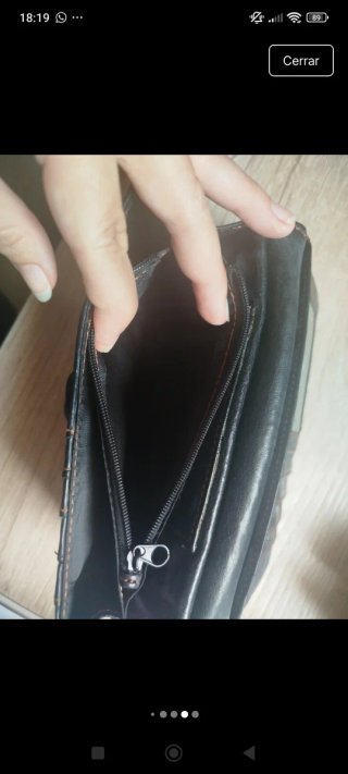 Cartera de piel nueva solidaria