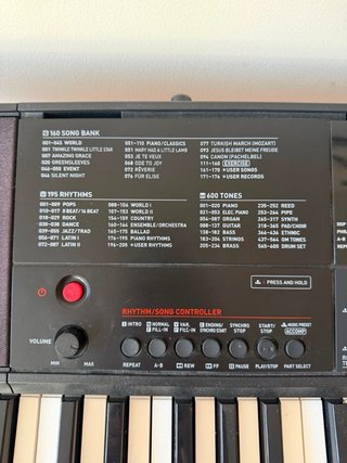 Teclado electrónico con soporte