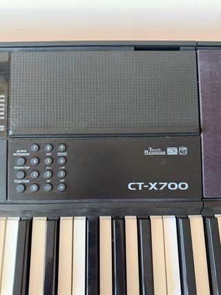 Teclado electrónico con soporte