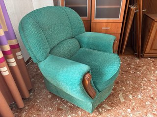 Sillones tapizados de color verde