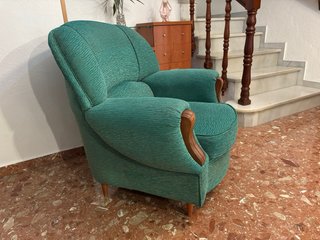 Sillones tapizados de color verde