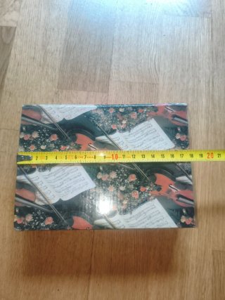 Elegante caja violín partitura