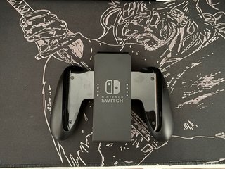 Nintendo Switch OLED + 4 Giochi Pokémon + Custodia